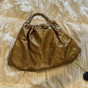 Elie Tahiri gold bag